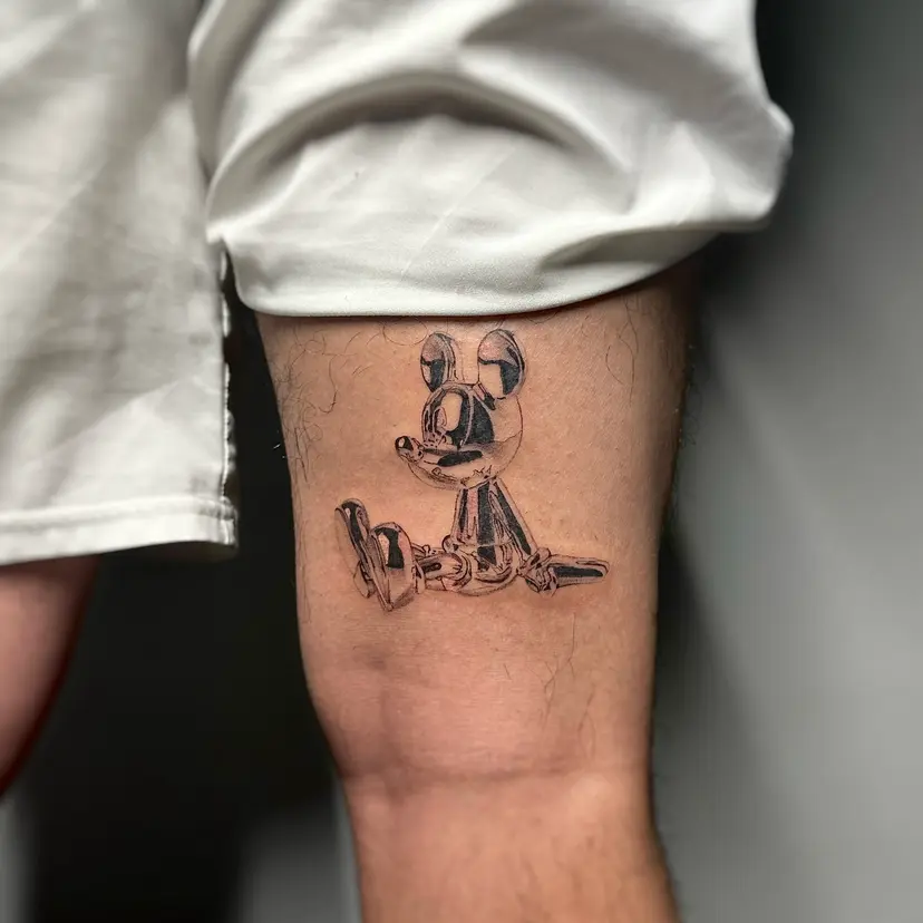 Chrome-style Mickey Mouse tattoo